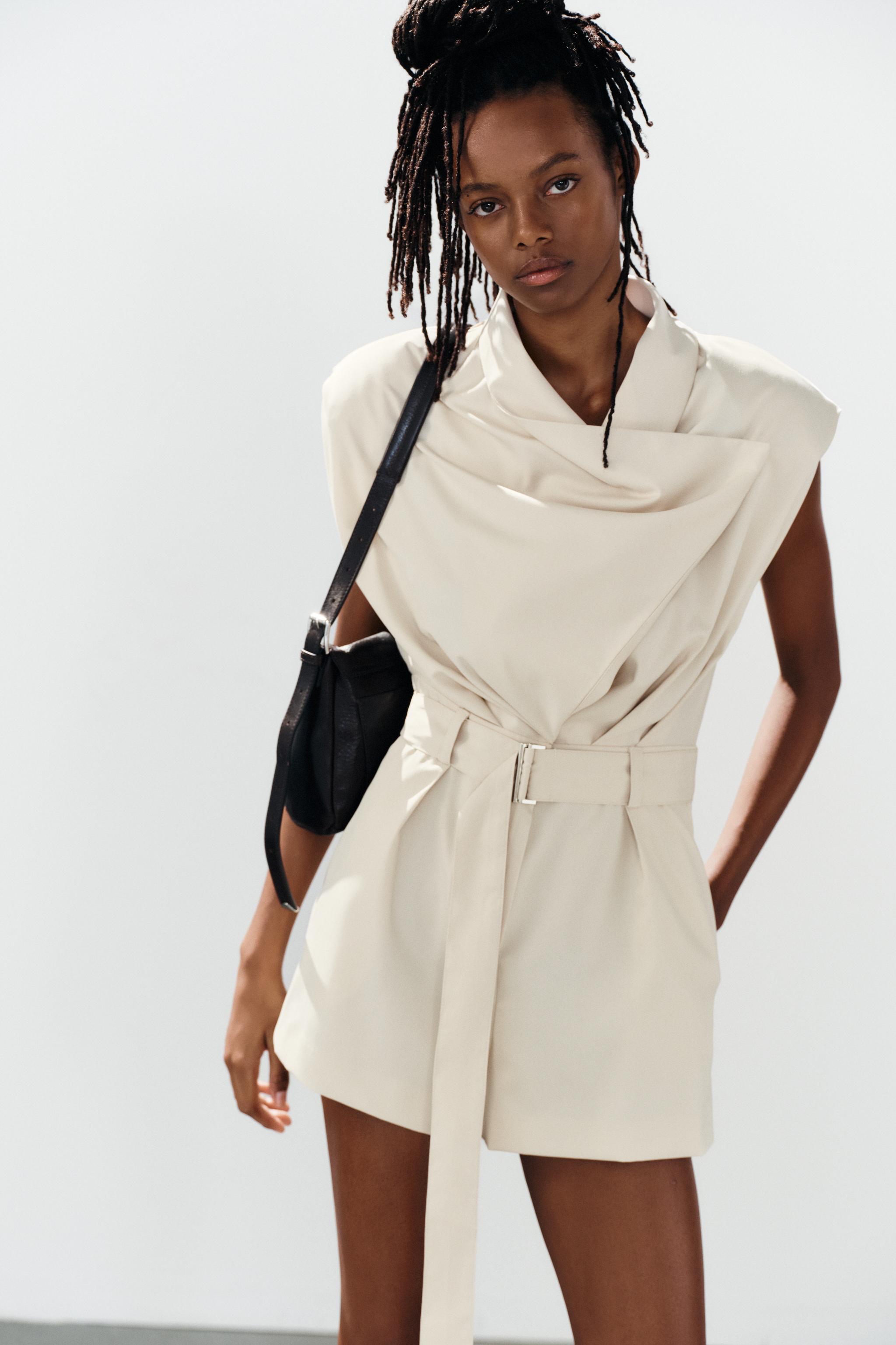 SHOULDER PAD BELTED SHORT JUMPSUIT